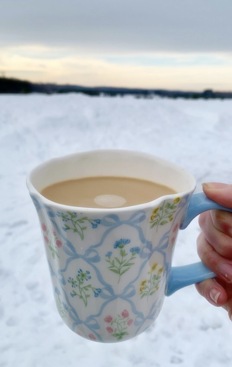 Coffee in a pretty mug on a cold winters day